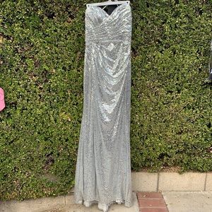 Long silver strapless dress with high slit - perfect for prom!